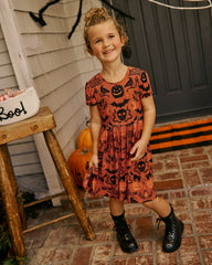 Midnight Mischief Bow Back Skater Dress