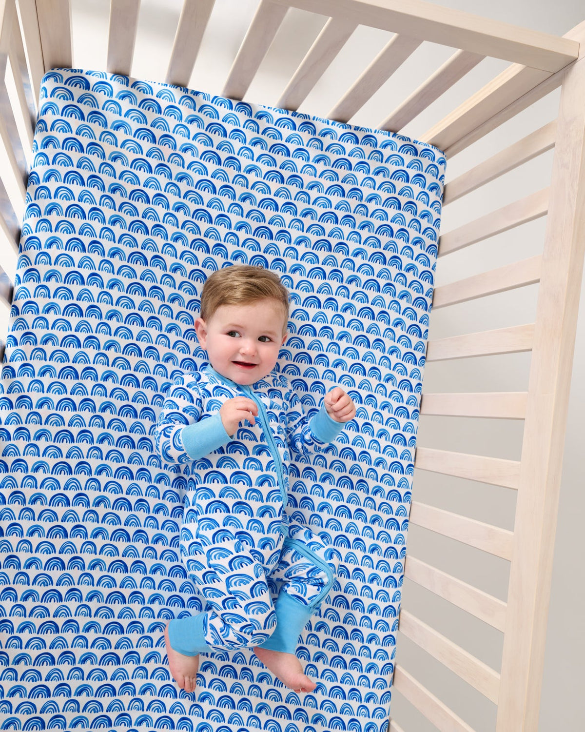 Blue Rainbows Fitted Crib Sheet